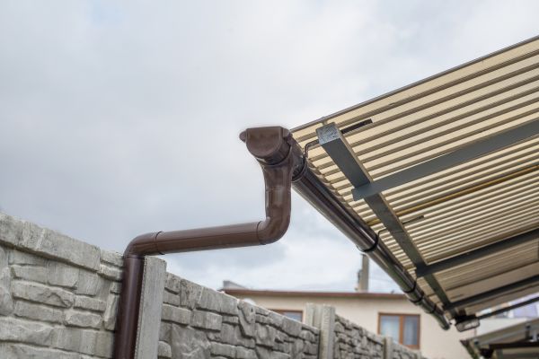 Plastic Downspout Installation in Arlington