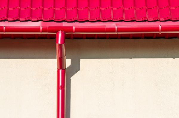 Cost of Downspout Reattachment in Arlington